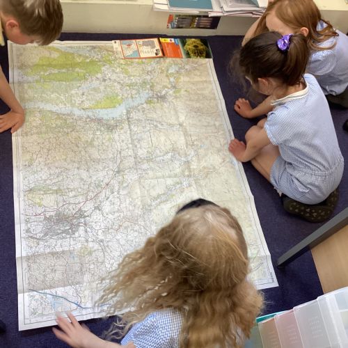 How do mountains appear on a map?